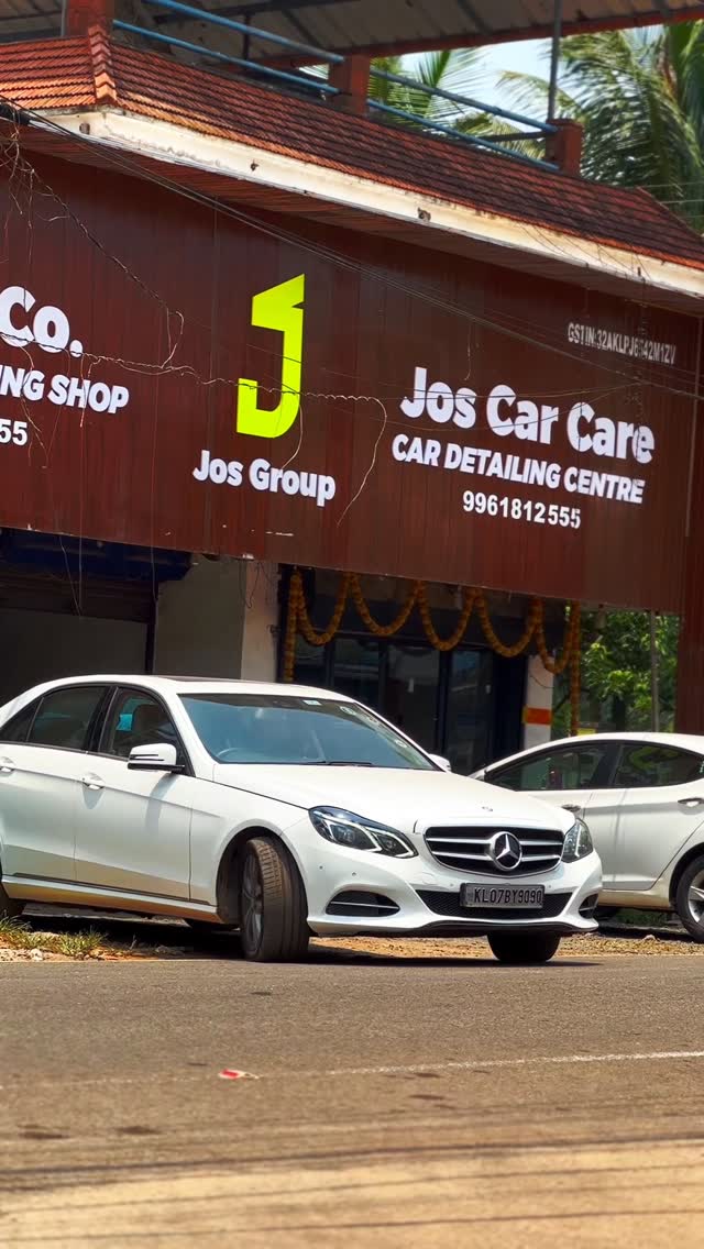 Mercedes E-Class outside Jos Car Care storefront